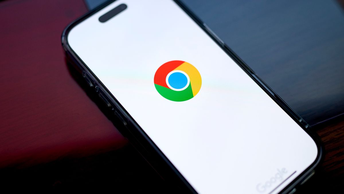 The Google Chrome logo on a smartphone arranged in the Queens borough of New York, US, on Monday, Nov. 18, 2024. Top Justice Department antitrust officials have decided to ask a judge to force Alphabet Inc.'s Google to sell off its Chrome browser in what would be a historic crackdown on one of the biggest tech companies in the world. Photographer: Gabby Jones/Bloomberg via Getty Images