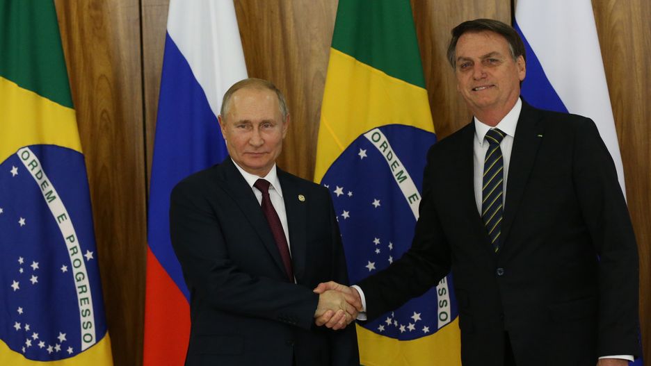 BRASILIA, BRAZIL - NOVEMBER,14 (RUSSIA OUT)  Russian President Vladimir Putin (L) greets  Brazilian President Jair Bolsonaro (R) during their meeting in Brasilia, Brazil, November,14,2019. Leaders of Russia, China, Brazil, India and South Africa have gateheres in Brasila for the BRICS Leaders Summit. (Photo by Mikhail Svetlov/Getty Images)
