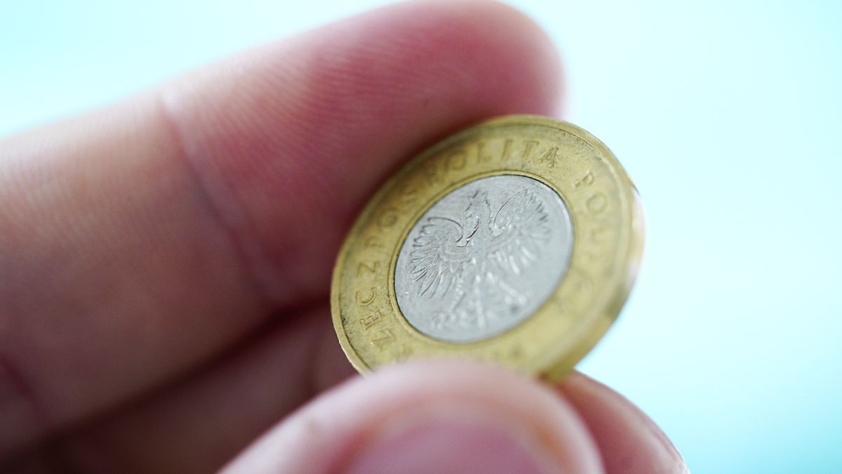 A Polish two zloty coin is seen in this photo illustration in Warsaw, Poland on September 29, 2020. The Polish zloty currency has seen it's weakest exchange rate against the Euro since April. The drop in exchange rate is mainly caused by discussions in the European Union on the violations of the rule of law in Poland which may result in blocking of access to EU recsontruction funds. (Photo by Jaap Arriens/NurPhoto via Getty Images)