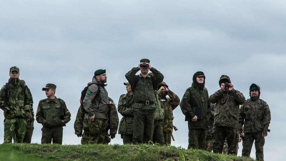 Zapad Joint Military Exercises Between Russia And Belarus
ASIPOVICHY, BELARUS - SEPTEMBER 18: Russian and Belarusian soldiers watching the Zapad 2017 military exercises at the Asipovichy military training ground on September 18, 2017 in in Asipovichy, Belarus. The joint military exercises between Belarus and Russia, last held four years ago, have raised alarm in the NATO-member countries to the west over concerns that as many as 100,000 troops may take part, well above the declared 12,700, and that it will serve as cover for Russia to move a permanent contingent of soldiers to Belarus or potentially launch incursions into neighboring countries. (Photo by Brendan Hoffman/Getty Images)
Brendan Hoffman