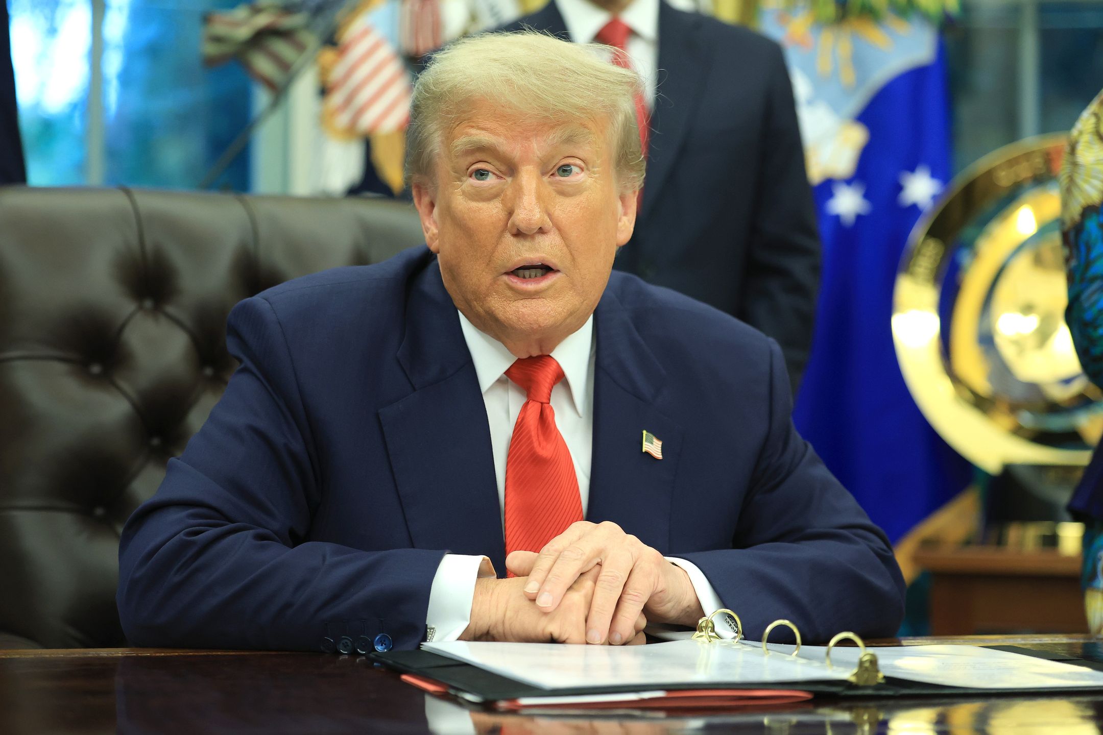 WASHINGTON, DC - JUNE 27: U.S. President Donald Trump delivers remarks as he meets with Minister of Foreign Affairs and Cooperation of Rwanda Olivier Nduhungirehe and the Foreign Minister of the Democratic Republic of the Congo Thérèse Kayikwamba Wagner in the Oval Office at the White House on June 27, 2025. The meeting took place as a peace agreement brokered by the White House, which hopes to end a conflict in eastern Democratic Republic of Congo, was signed by officials of the two African nations.  (Photo by Joe Raedle/Getty Images)