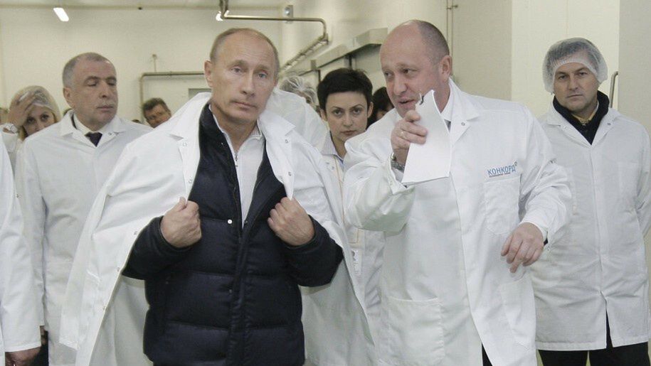 arch29
In this pool photo taken on Monday, Sept. 20, 2010, businessman Yevgeny Prigozhin, center right, shows Russian President Vladimir Putin, center left, around his factory which produces school lunches, outside St. Petersburg, Russia. One of those indicted in the Russia probe is a businessman with ties to Russian President Vladimir Putin. Prigozhin is an entrepreneur from St. Petersburg who's been dubbed "Putin's chef" by Russian media. His restaurants and catering businesses have hosted the Kremlin leader's dinners with foreign dignitaries. (Alexei Druzhinin, Sputnik, Kremlin Pool Photo via AP)
POOL SPUTNIK KREMLIN