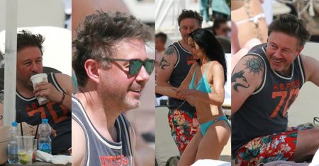 Andrzej Piaseczny relaksuje się na plaży w Sopocie i gawędzi z Alicją z "Big Brothera" (ZDJĘCIA)