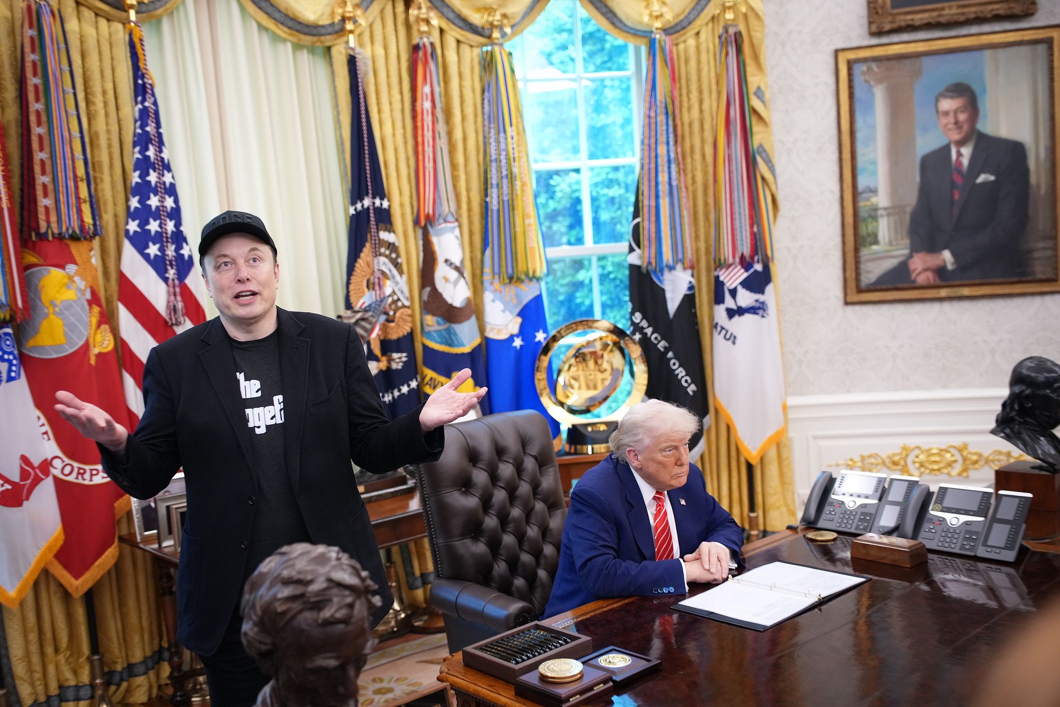 WASHINGTON, DC - MAY 30: Tesla CEO Elon Musk speaks alongside U.S. President Donald Trump to reporters in the Oval Office of the White House on May 30, 2025 in Washington, DC. Musk, who served as an adviser to Trump and led the Department of Government Efficiency, announced he would leave his role in the Trump administration to refocus on his businesses.  (Photo by Kevin Dietsch/Getty Images)