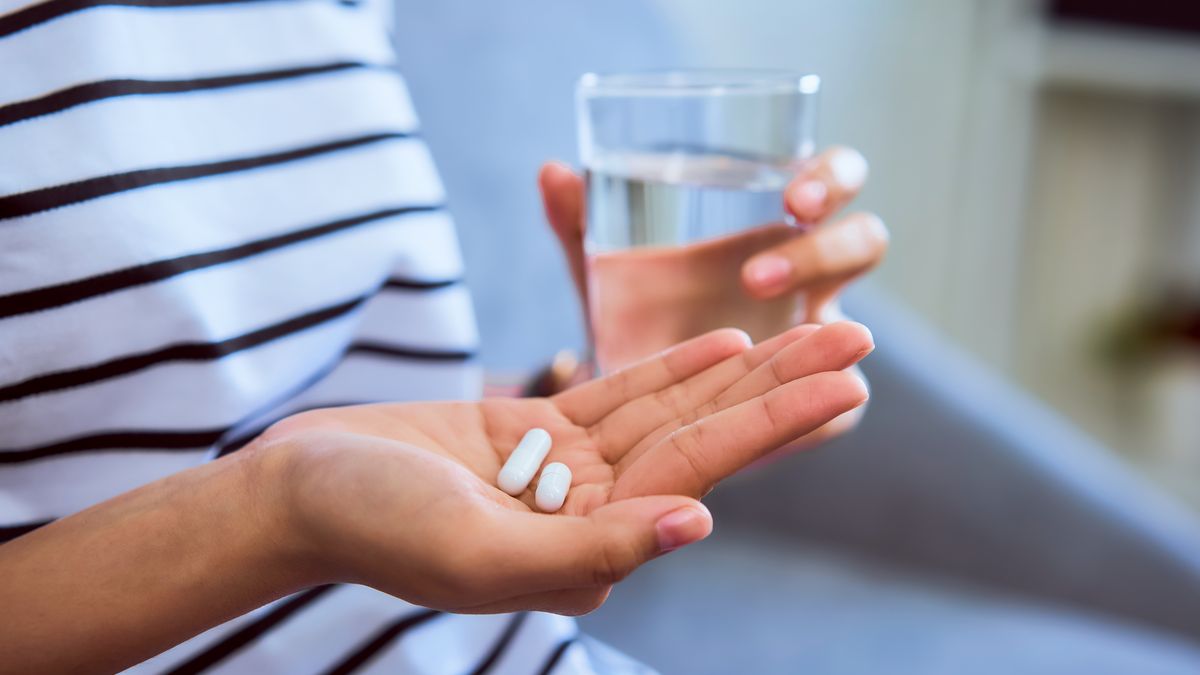 Pacjentka przyjmująca tabletki