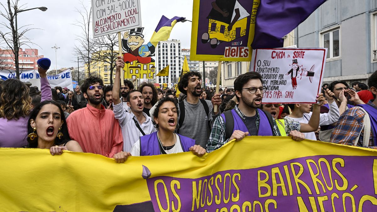 Protest Over Right To Housing In LisbonLISBON, PORTUGAL - APRIL 01: Demonstrators hoist signs while parading during the "Casa Para Viver" (A House to Live In) protest on April 01, 2023 in Lisbon, Portugal. Demonstrations for the right to housing are held in Lisbon, Porto, Viseu, Aveiro, Coimbra and Braga to protest the increase in house prices while wages have stagnated or have decreased. The protest organizers state that precarious housing conditions and the high prices of real estate in Portugal led some 100 organizations to unite and sign a manifesto with 12 proposals such as effective regulation of rents, penalization of empty houses, suspension of evictions and the end of tax incentives for non-regular residents. (Photo by Horacio Villalobos#Corbis/Getty Images)Horacio Villalobos