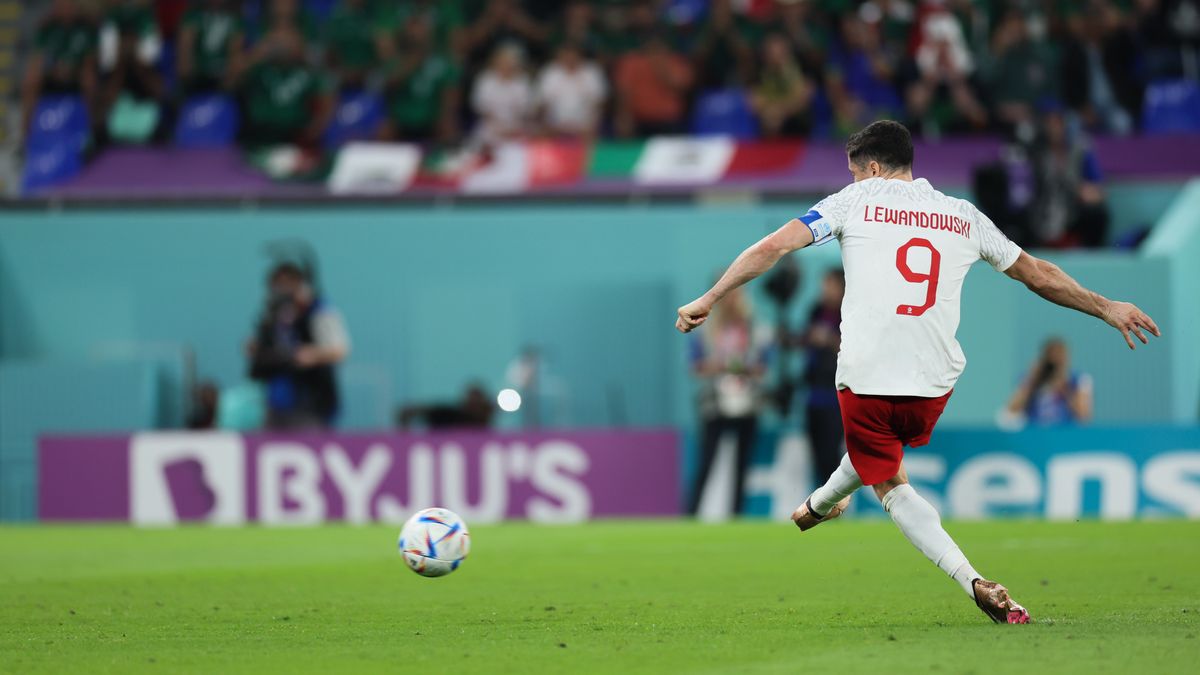 DOHA, QATAR - NOVEMBER 22: Robert Lewandowski #9 of Poland shots a penalty saved by goalkeeper Guillermo Ochoa #13 of Mexico during the FIFA World Cup Qatar 2022 Group C match between Mexico and Poland at Stadium 974 on November 22, 2022 in Doha, Qatar. (Photo by Liu Lu/VCG via Getty Images)