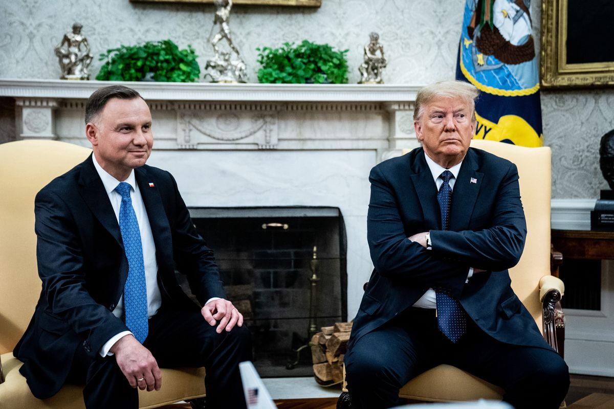 WASHINGTON, DC - JUNE 24: (L-R) Polish President Andrzej Duda meets with U.S. President Donald in the Oval Office of the White House on June 24, 2020 in Washington, DC. Duda, who faces a tight re-election contest in four days, is Trump's first world leader visit from overseas since the coronavirus pandemic began. (Photo by Erin Schaff-Pool/Getty Images)