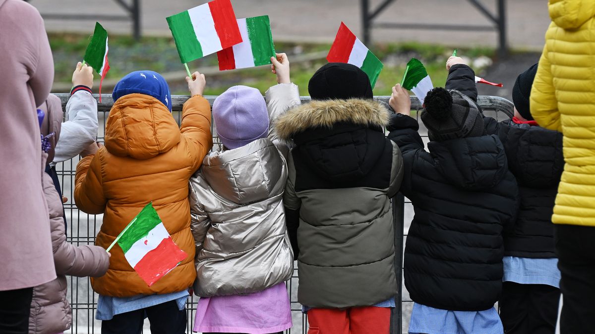 NORCIA, ITALY - MARCH 13: Children wave the Italian flag prior to the 60th Tirreno-Adriatico 2025, Stage 3 a 190km stage from Norcia to Trasacco / #UCIWT / on March 13, 2025 in Norcia, Italy. (Photo by Tim de Waele/Getty Images)