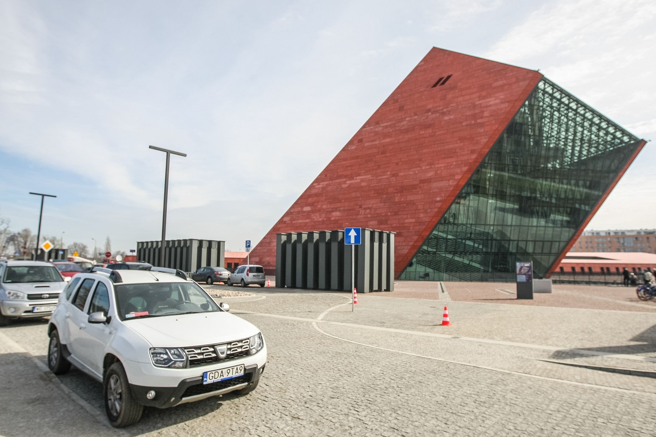 White Dacia Duster SUV in front of World War II museum is seen in Gdansk, Poland on 23 March 2017  (Photo by Michal Fludra/NurPhoto via Getty Images)