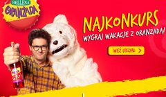 Kuba Wojewódzki z białym misiem reklamuje „NajKonkurs!” promujący Oranżadę Hellena
