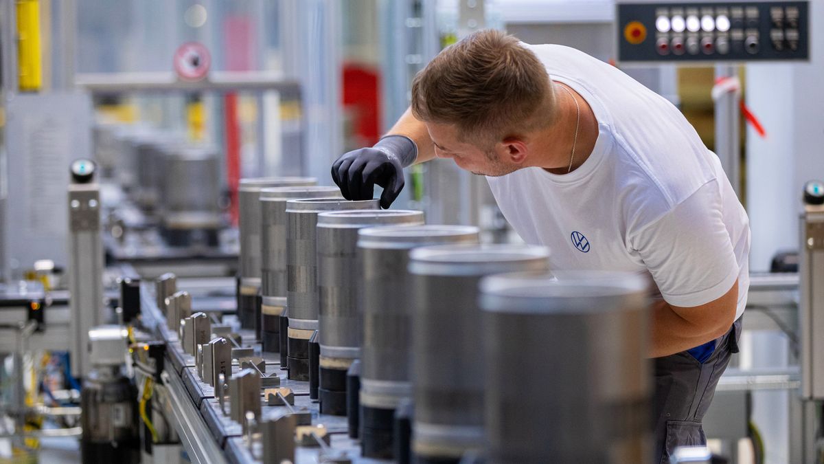 An employee checks the finished components on the electric motor rotor production line at the SalzGiga fuel cell gigafactory, operated by Volkswagen Group Components, in Salzgitter, Germany, on Wednesday, May 18, 2022. VWs future battery hub at Salzgitter will start production in 2025 for the companys volume cars. Photographer: Krisztian Bocsi/Bloomberg via Getty Images