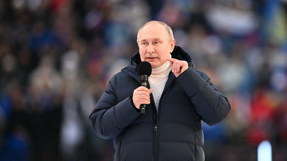 Putin na obchodach 8 rocznicy referendum na KrymieRussian President Vladimir Putin gives a speech at a concert marking the eighth anniversary of Russia's annexation of Crimea at the Luzhniki stadium in Moscow on March 18, 2022. (Photo by Ramil SITDIKOV / POOL / AFP)RAMIL SITDIKOV