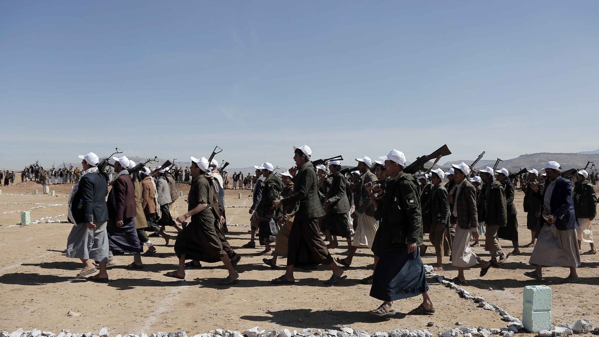 SANAA, YEMEN - JANUARY 22: Houthi supporters gather as they carry heavy weapons and chanting slogans to stage a parade and demonstrate against the US and UK attacks in the Bani Hushaish area in Sanaa, Yemen on January 22, 2024. (Photo by Mohammed Hamoud/Anadolu via Getty Images)