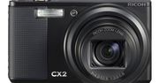 Ricoh CX2 - zoom 10x, CMOS, 5 kl./s oraz...