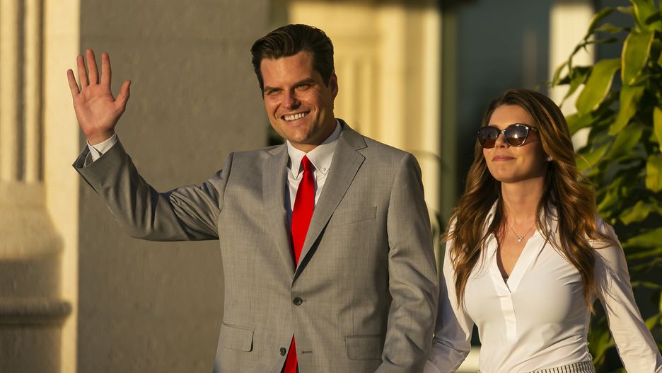 U.S. Rep. Matt Gaetz (R-Florida) and his fiancee Ginger Luckey arrive to the "Save America Summit" at the Trump National Doral Resort in Doral, Florida, on April 9, 2021. (Matias J. Ocner/Miami Herald/Tribune News Service via Getty Images)