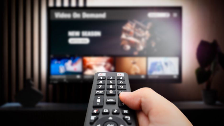Man watching TV with remote control in hand.
VOD service screen. Man watching TV with remote control in hand.
simpson33
1080p, video-on-demand, vod