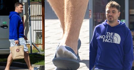 Markotny Daniel Martyniuk snuje się po ulicach Warszawy w klapkach i BRUDNYCH skarpetkach. Zabrakło mamy do pomocy? (ZDJĘCIA)
