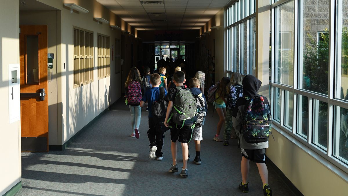 THORNTON, COLORADO - AUGUST 12: Students head to class at West Ridge Elementary, in the 27J School District, on August 12, 2021 in Thornton, Colorado. (Photo by RJ Sangosti/MediaNews Group/The Denver Post via Getty Images)