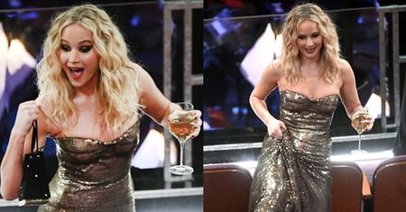 Jennifer Lawrence w sukni z cekinami dzielnie walczy z siedzeniami (ZDJĘCIA)