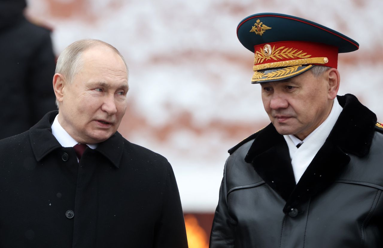 MOSCOW, RUSSIA - FEBRUARY 23:  (RUSSIA OUT) Russian President Vladimir Putin (L) talks to Defence Minister Sergei Shoigu (R) looks on while taking part in the wreath laying ceremony at the Unknown Soldier Tomb, marking the Defender of the Fatherland's Day, on February 23, 2024, in Moscow, Russia. Putin is candidate for the 2024 Presidential Elections. (Photo by Contributor/Getty Images)