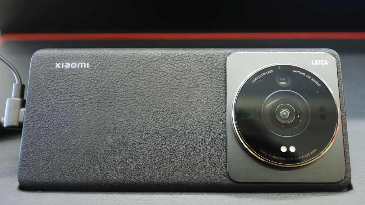 HANGZHOU, CHINA - JULY 5, 2022 - A Xiaomi 12S Ultra is pictured at a Xiaomi store in Hangzhou, East China's Zhejiang Province, July 5, 2022. Photo enthusiasts came to the mi 12SUltra, the first Chinese smartphone equipped with a 1-inch sensor. The Mi 12S Ultra is the first Chinese mobile phone brand to be equipped with SONY IMX989 sensor with 1-inch rear and optical lens cooperated with Leica, which greatly improves the picture quality of mobile phone shooting and will bring better shooting experience for users. (Photo credit should read CFOTO/Future Publishing via Getty Images)