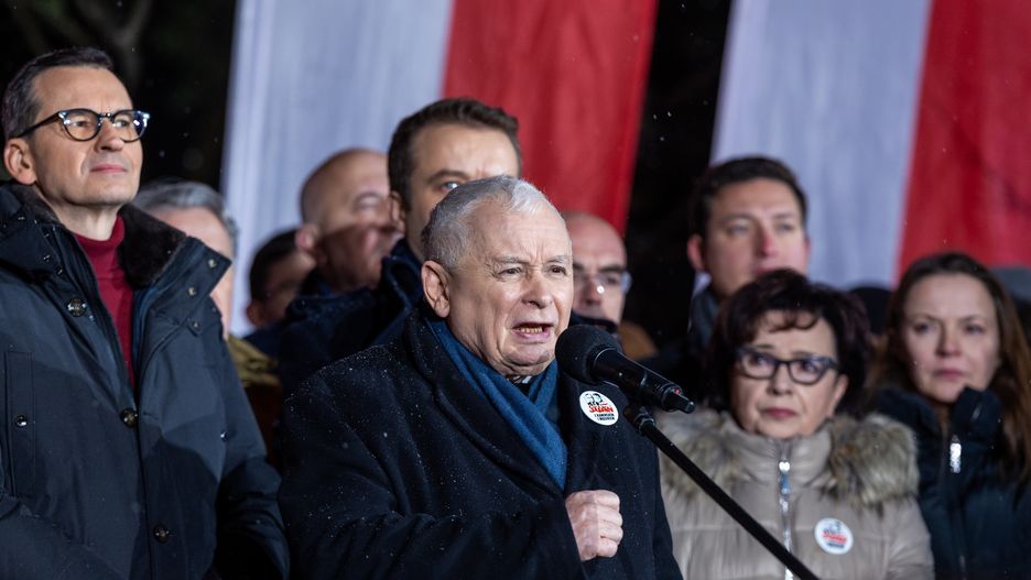Mateusz Morawiecki (L) and Law and Justice Party leader Jaroslaw Kaczynski (C) are participating in the Anti-government 'Free Poles Protest'. Demonstrators are marching in front of the Polish Parliament building in Warsaw, Poland, on January 11, 2024, protesting against the new Civic Platform party government, the change of the board of directors in public media, and the arrest of former Law and Justice party politicians Mariusz Kaminski and Michal Wasik. (Photo by Andrzej Iwanczuk/NurPhoto via Getty Images)