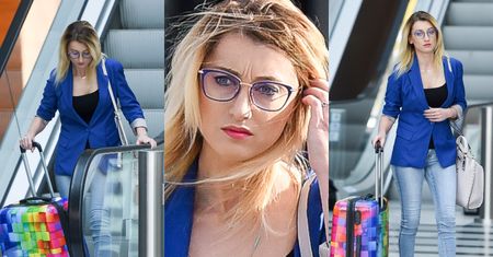 Justyna Żyła opuszcza budynek TVP z kolorową walizką i skwaszoną miną (ZDJĘCIA)
