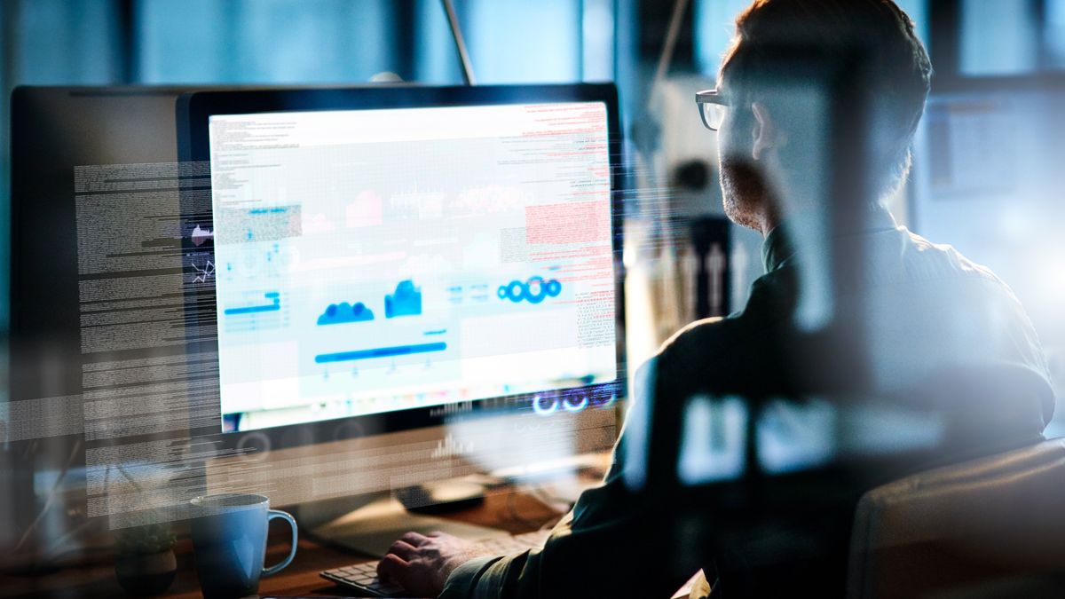 Concentrated on the codeCropped shot of a male computer programmer working on new codePeopleImagesWireless Technology, Computer, Using Computer, Businessman, One Man Only, Only Men, One Young Man Only, Young Men, Men, Males, Copy Space, Adults Only, Nerd, Computer Network, Computer Programmer, E-Mail, 20-29 Years, Young Adult, Adult, Sitting, Working, One Person, Expertise, Skill, Connection, Communication, Dark, Part Of, Inside Of, Business, Technology, Indoors, Photographic Effects, Digitally Generated Image, Business Person, Office Worker, Professional Occupation, Occupation, People, Office, Place of Work, Internet, Computer Software, Computer Monitor, Data, Casual Clothing