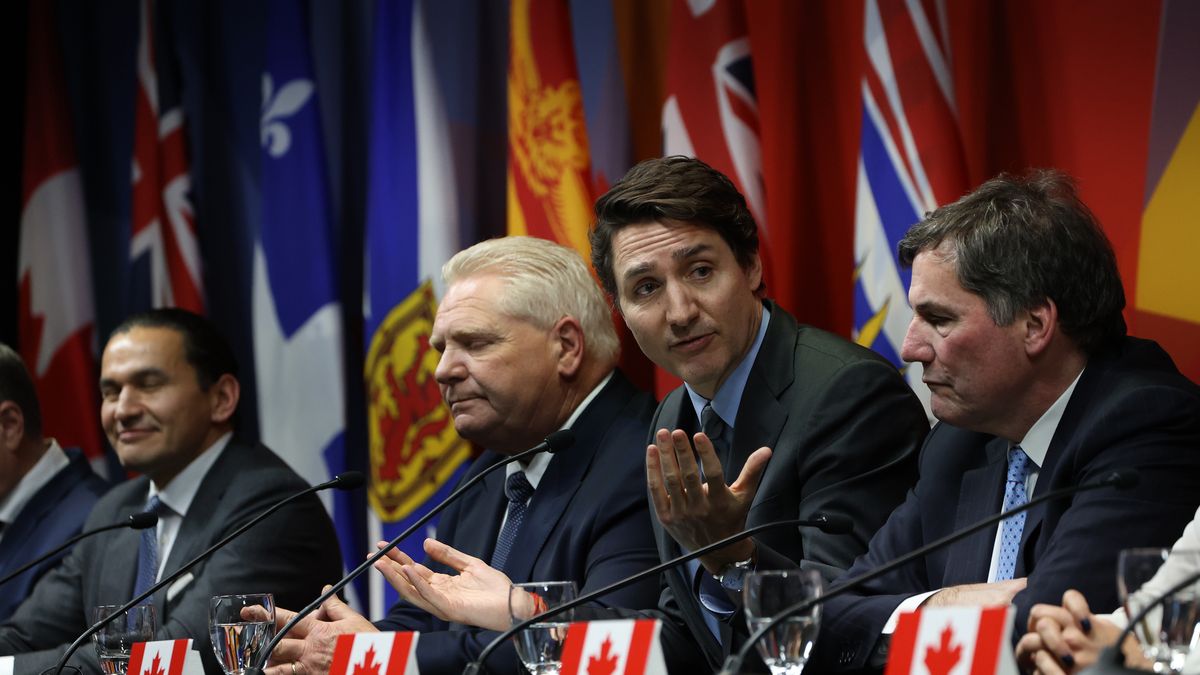 Doug Ford, Ontario's premier, from second left,  Justin Trudeau, Canada's prime minister, and Dominic LeBlanc, Canada's finance and intergovernmental affairs minister, during a news conference at the First Ministers' Meeting in Ottawa, Ontario, Canada, on Wednesday, Jan. 15, 2025. The prime minister and the premiers are preparing a list of retaliatory tariffs and is examining the possibility of harsher measures, such as placing export taxes on oil, uranium and potash to drive up costs for US consumers and businesses in the event Trump starts an all-out trade war. Photographer: David Kawai/Bloomberg via Getty Images