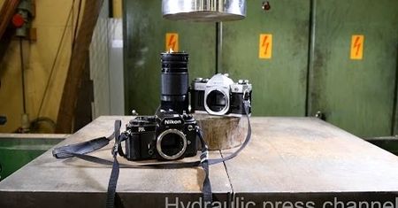 Co jest wytrzymalsze – Canon czy Nikon? Oto test ostateczny pod naciskiem prasy hydraulicznej