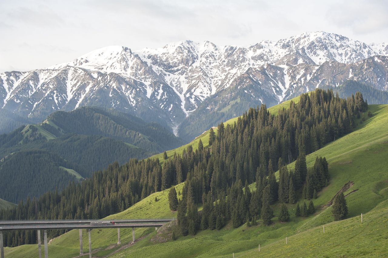 A bridge crossing a valley in mountainous region, Xinjang Uyghur Autonomous Region