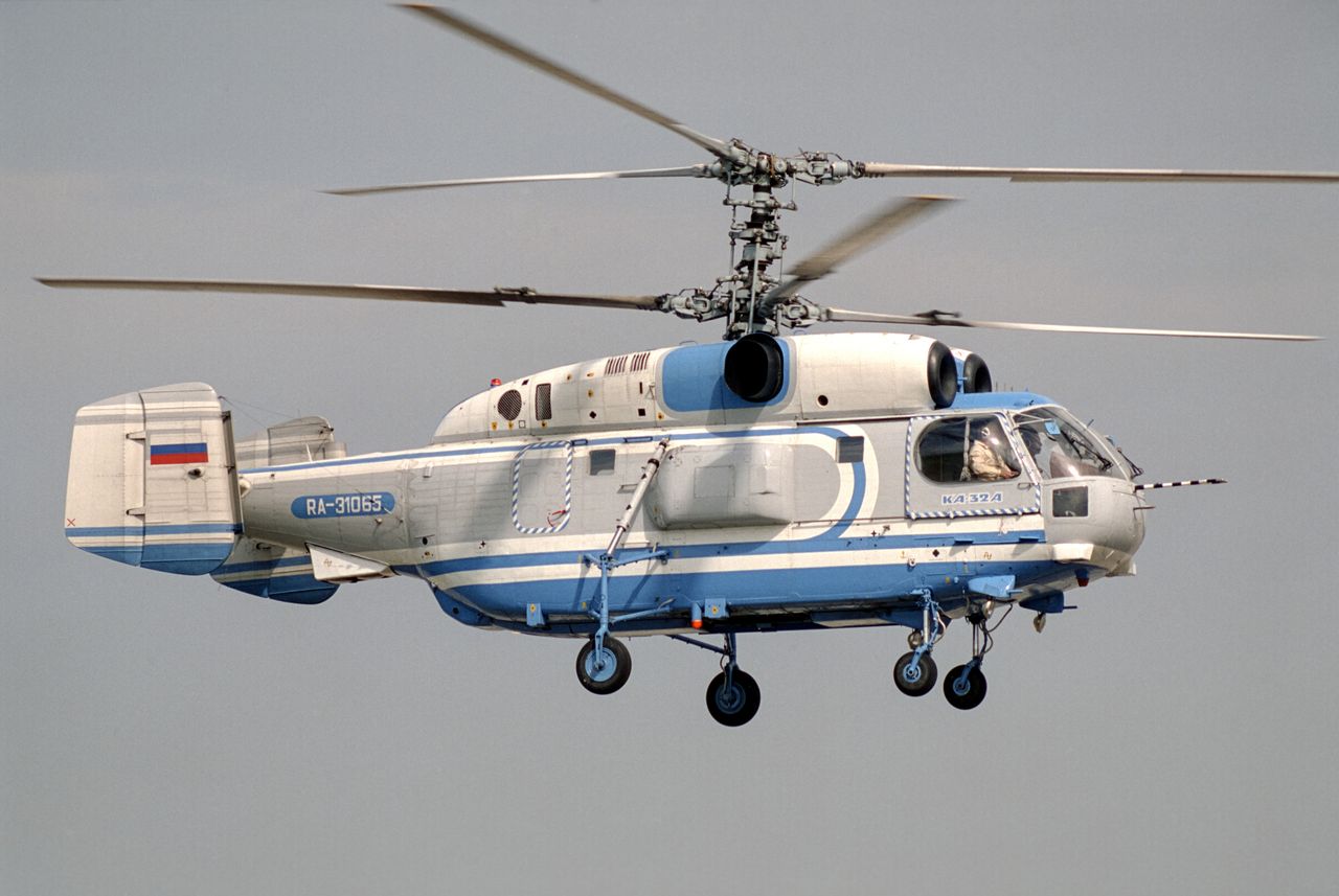 Young Russians torch helicopter for Ukraine