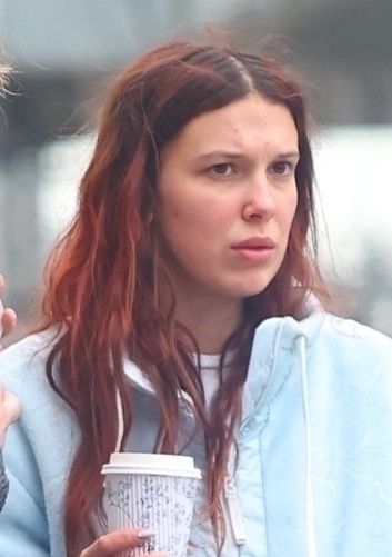 *EXCLUSIVE* Cozied Up Family! Millie Bobby Brown and Jake Bongiovi pushing a stroller with their adopted baby daughter in New York City **WEB MUST CALL FOR PRICING**BlayzenPhotos / BACKGRID / Backgrid USA / ForumMillie Bobby Brown, Jake Bonjovi, West Village, shopping, Golden Goose, daughter, pink stroller