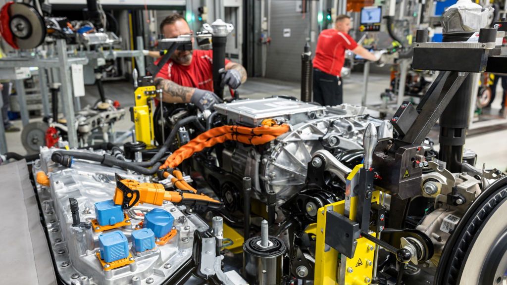 Porsche Produces New All Electric Macan SUV
LEIPZIG, GERMANY - MAY 6: A worker assemble at the electric drivetrain of the new all-electric Porsche Macan at the Porsche assembly plant on May 6, 2024 in Leipzig, Germany. The electric Macan is Porsche's second electric car after the Taycan. The company also offers two hybrid cars. (Photo by Jens Schlueter/Getty Images)
Jens Schlueter