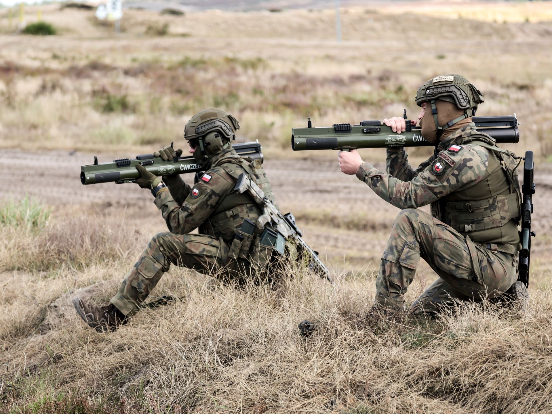 NOWA DEBA, POLAND - 2025/09/18: Polish infantry soldiers of the Territorial Defense Forces train live-fire with M72 LAW, a portable unguided anti-tank weapon for a surprise attack during the Iron Defender 25 media day. The Iron Defender 25 exercise is the largest and most significant training event planned by and for the Polish Armed Forces. It is a series of defensive exercises conducted on land, in the air and on water by the Land Forces, Air Force, Navy, Special Forces and Territorial Defense Forces. Thirty thousand soldiers and 600 pieces of equipment from the Polish Armed Forces and NATO allies are participating. (Photo by Dominika Zarzycka/SOPA Images/LightRocket via Getty Images)
