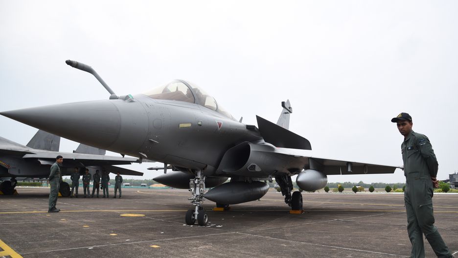 Indian Air Force personnel are standing next to a Rafale fighter jet during the joint 'Exercise Cope India 2023' at the air force station in Kalaikunda, around 170 km west of Kolkata, on April 24th, 2023. The United States Air Force (USAF) F-15 fighter aircraft and the Indian Air Force (IAF) Su-30 MKI, Rafale, Tejas and Jaguar fighter aircraft are joining the exercise, which is supported by aerial refuellers, Airborne Warning and Control System and Airborne Early Warning and Control aircraft of the IAF. (Photo by Debajyoti Chakraborty/NurPhoto via Getty Images)