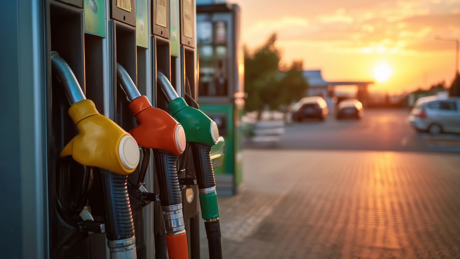 gas station, sunset, fuel pumps, colorful, evening, cars, parking lot, transportation, urban, dusk, fuel, gasoline, road trip, travel, landscape, twilight, convenience, vehicles, city, pump nozzle, service station, outdoor, commerce, highway, rest stop, travel essentials, bright colors, scenic, oil, infrastructure, rural, convenience store, service, energy, retail, community, machinery, modern, twilight glow, sky, horizon