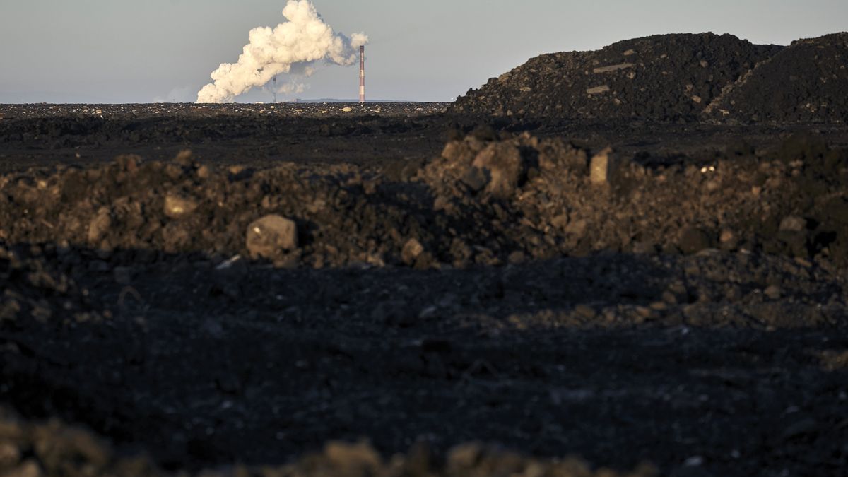 Vapor rises from a cooling tower at the JSW Koks SA coking factory, in Radlin, from coal tailings at the Jankowice coal mine in Rybnik, Poland, on Friday, March 17, 2023. The Intergovernmental Panel on Climate Change (IPCC) - the United Nations body for assessing the science related to climate change - is preparing to issue the Synthesis Report, a comprehensive review of climate change, its impacts and possible solutions. Photographer: Bartek Sadowski/Bloomberg via Getty Images