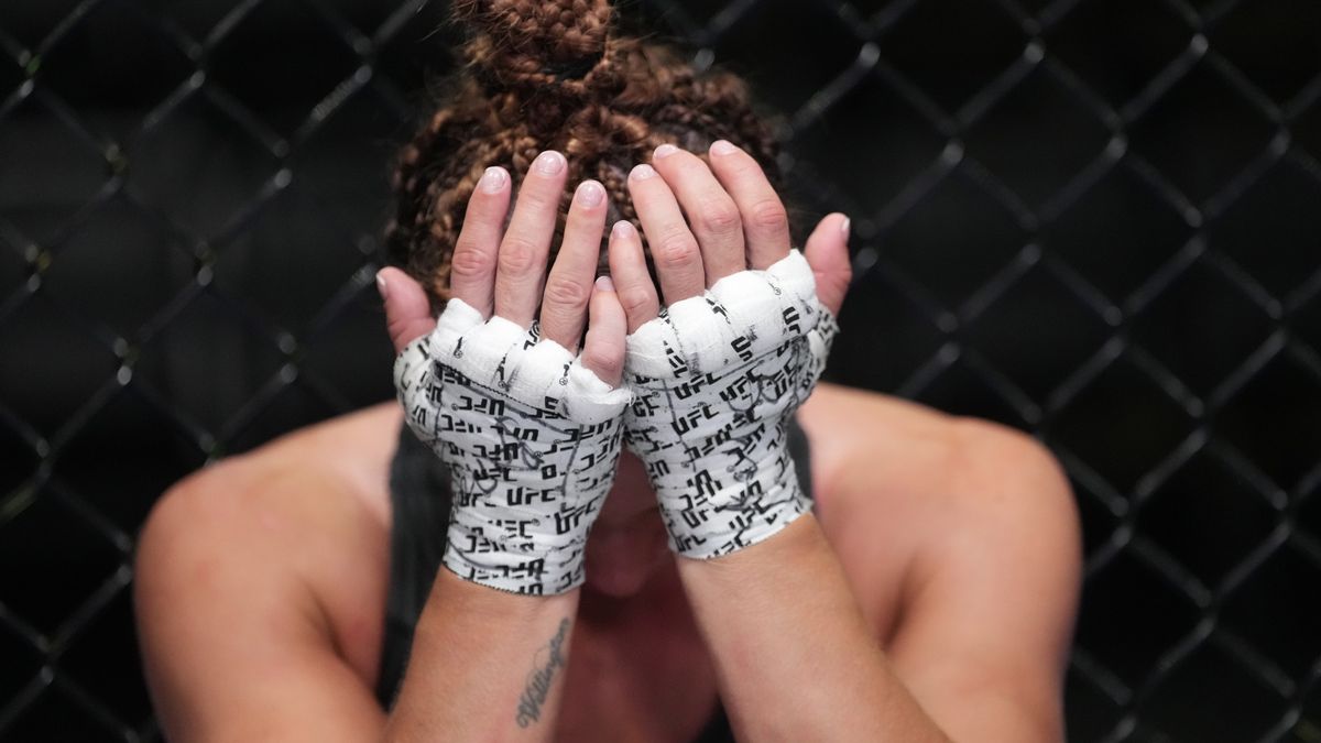 LAS VEGAS, NEVADA - OCTOBER 01: Mackenzie Dern reacts after her decision loss to Yan Xiaonan of China in a strawweight fight during the UFC Fight Night event at UFC APEX on October 01, 2022 in Las Vegas, Nevada. (Photo by Jeff Bottari/Zuffa LLC)