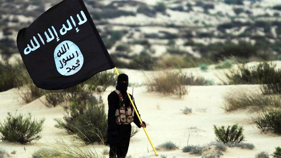Islamic State/Iraq/Syria: A masked Islamic State soldier poses holding the ISIL banner somewhere in the deserts of Iraq or Syria. ISIL publicity image, 2015
Islamic State/Iraq/Syria: A masked Islamic State soldier poses holding the ISIL banner somewhere in the deserts of Iraq or Syria. ISIL publicity image, 2015. (Photo by: Pictures from History/Universal Images Group via Getty Images)
Pictures from History
asian, banner, crimes against humanity, daesh, iconoclasm, iraqi isis, isil, islamic state in iraq and the levant, militant, muslim, salafism, soldier, syrian, vexillology, war crimes