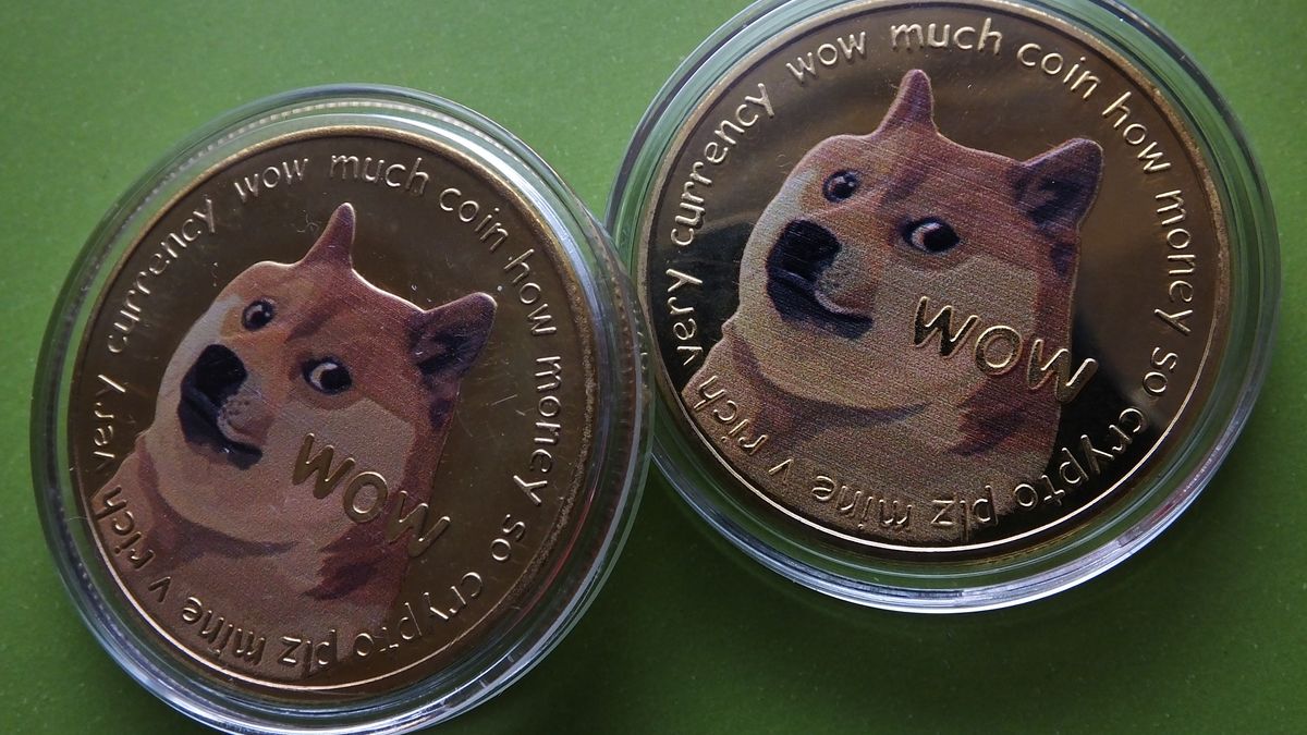 YICHANG, CHINA - APRIL 26: Visual representations of digital cryptocurrencies Dogecoin are seen on April 26, 2021 in Yichang, Hubei Province of China. (Photo by Liu Junfeng/VCG via Getty Images)