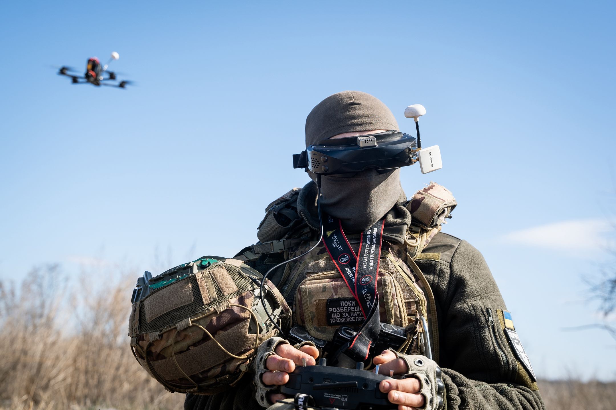 A Ukrainian soldier performs a trial with an FPV drone in the region of Kharkiv, Ukraine, on March 19, 2025. (Photo by Alfons Cabrera/NurPhoto via Getty Images)