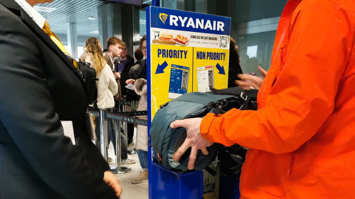 Passengers are measuring their luggage in Ryanair frame before boarding airplane at Krakow Airport in Balice near Krakow, Poland on March 11, 2025. (Photo by Beata Zawrzel/NurPhoto via Getty Images)