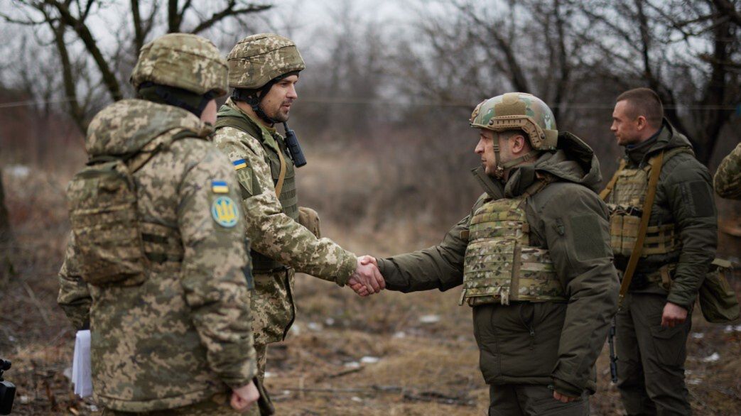 DONBASS, UKRAINE - FEBRUARY 11: (----EDITORIAL USE ONLY  MANDATORY CREDIT - "UKRAINIAN PRESIDENCY / HANDOUT" - NO MARKETING NO ADVERTISING CAMPAIGNS - DISTRIBUTED AS A SERVICE TO CLIENTS----) Ukrainian President Volodymyr Zelensky (R) inspects during his visit along with G7 ambassadors in Donbass, Ukraine on February 11, 2021. (Photo by Ukrainian Presidency / Handout/Anadolu Agency via Getty Images)