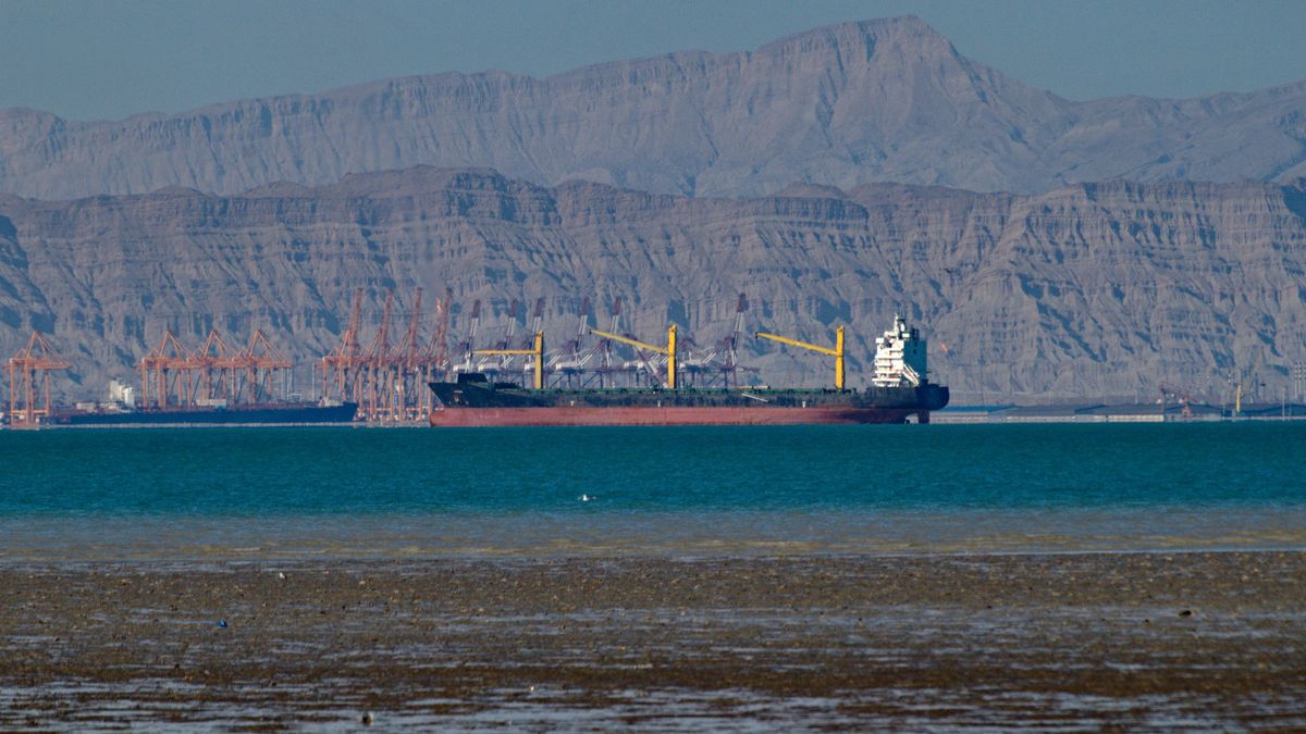 Large cargo ship at Shahid Rajai port from Dargahan in low tide from Qeshm island, Persian Gulf, IranLarge cargo ship at Shahid Rajai port from Dargahan in low tide from Qeshm island, Persian Gulf, IranGermán Vogelqeshm county, bandar-e dargahan, dargahan, market, oil, trade, strategic geolocation, shahid rajai port, islamic republic of iran, hormozgan, qeshm, travel destination