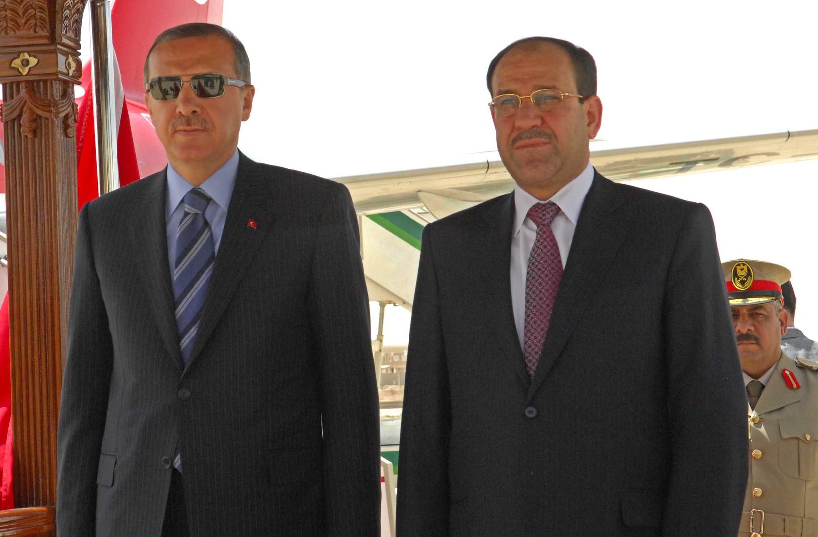 Turkish PM Arrives in BaghdadBAGHDAD, IRAQ - JULY 10: In this handout image provided by the Iraqi Prime Minister Office,  Iraqi Prime Minister Nuri al-Maliki (R) receives Turkish Prime Minister Recep Tayyip Erdogan as he arrives at Baghdad airport on July 10, 2008 in Baghdad, Iraq. Erdogan's visit is the first by a Turkish PM in 18 years and is focusing on strenthening political and economic relations between the two nations. It comes in the wake of an armed attack on the US embassy in Istanbul.   (Photo by Iraqi Prime Minister Office via Getty Images)HandoutBaghdad, Iraq, Sadr, Shiite, Sunni, militia