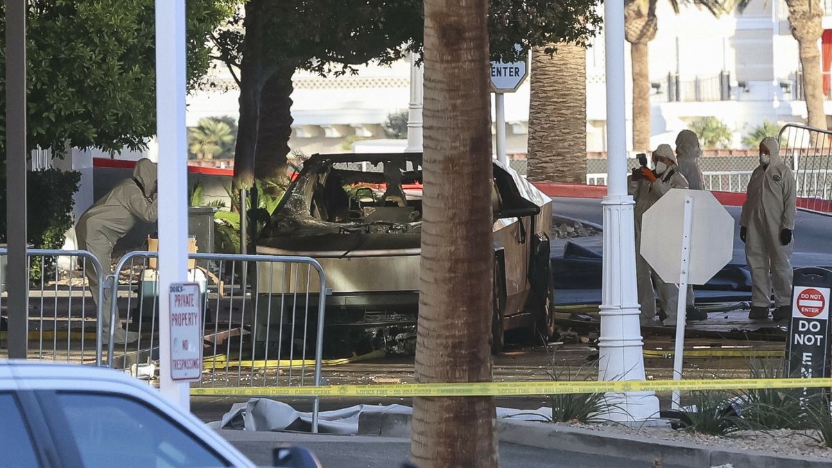 Temporary
Investigators photograph a Tesla Cybertruck that exploded outside the lobby of President-elect Donald Trump's hotel on January 1, 2025, in Las Vegas. At least one person was killed and seven wounded when a Tesla Cybertruck exploded outside a hotel belonging to US President-elect Donald Trump in Las Vegas, police said Wednesday. (Photo by WADE VANDERVORT / AFP)
WADE VANDERVORT