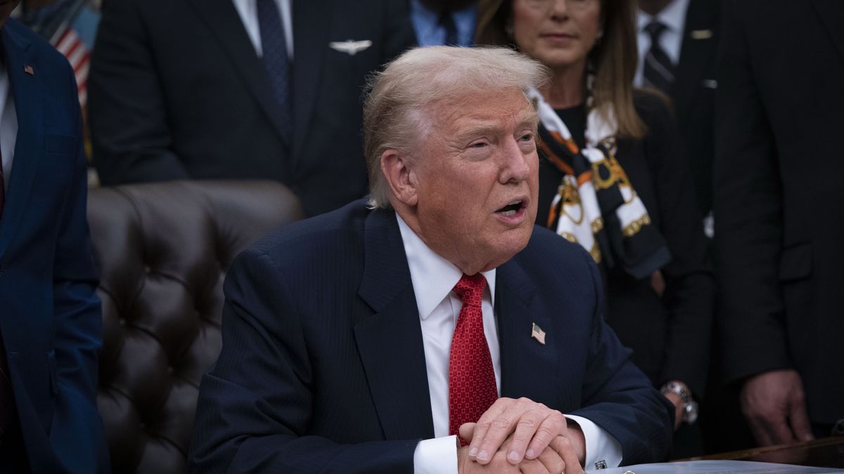 WASHINGTON,DC - NOVEMBER 12: President Donald Trump signs a bill to end the 43-day government shutdown in the Oval Office of the White House on Wednesday Nov. 12, 2025 in Washington, D.C. The shutdown was the longest in U.S. history. (Photo by Maxine Wallace/The Washington Post via Getty Images)