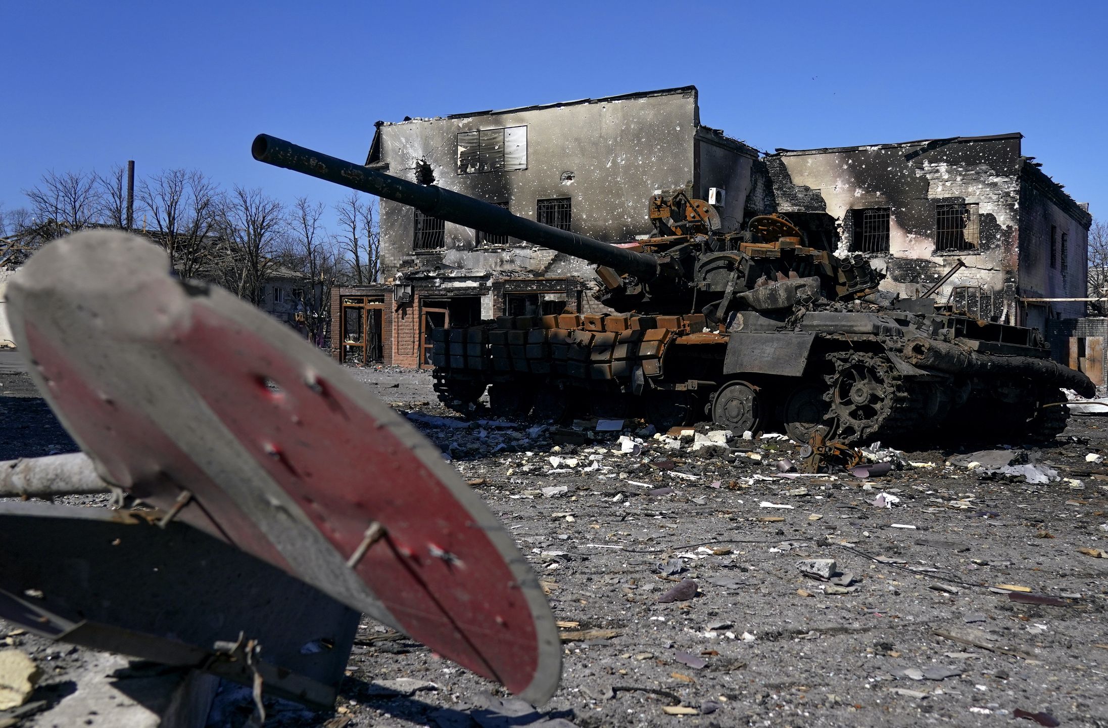 MARIUPOL, UKRAINE - MARCH 21: A damaged military vehicle as civilians are evacuated along humanitarian corridors from the Ukrainian city of Mariupol under the control of Russian military and pro-Russian separatists, on March 21, 2022. (Photo by Stringer/Anadolu Agency via Getty Images)